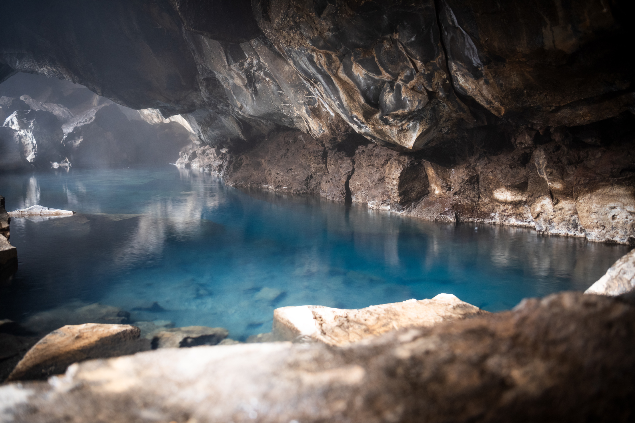 Geothermal hot spring inside Grjótagjá lava cave near Lake Mývatn, north Iceland — photographed by Marcel Strobel