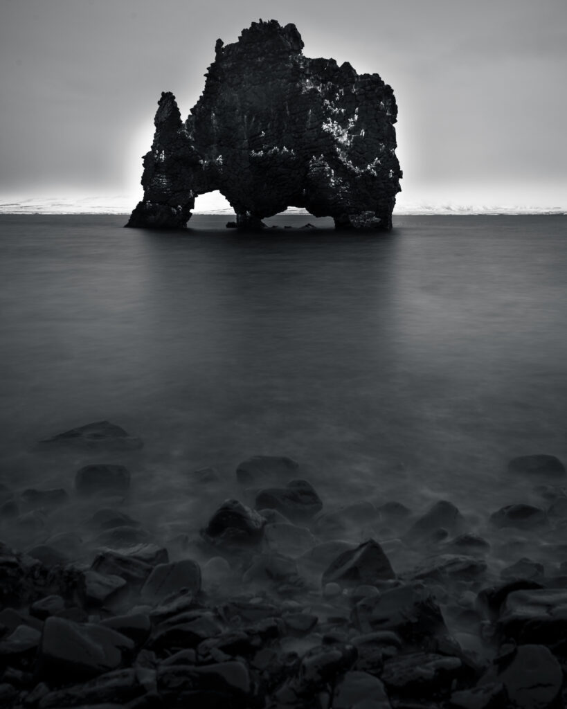 Hvítserkur basalt rock stack at high tide, Húnafjörður, northwest Iceland — long exposure black and white photography by Marcel Strobel