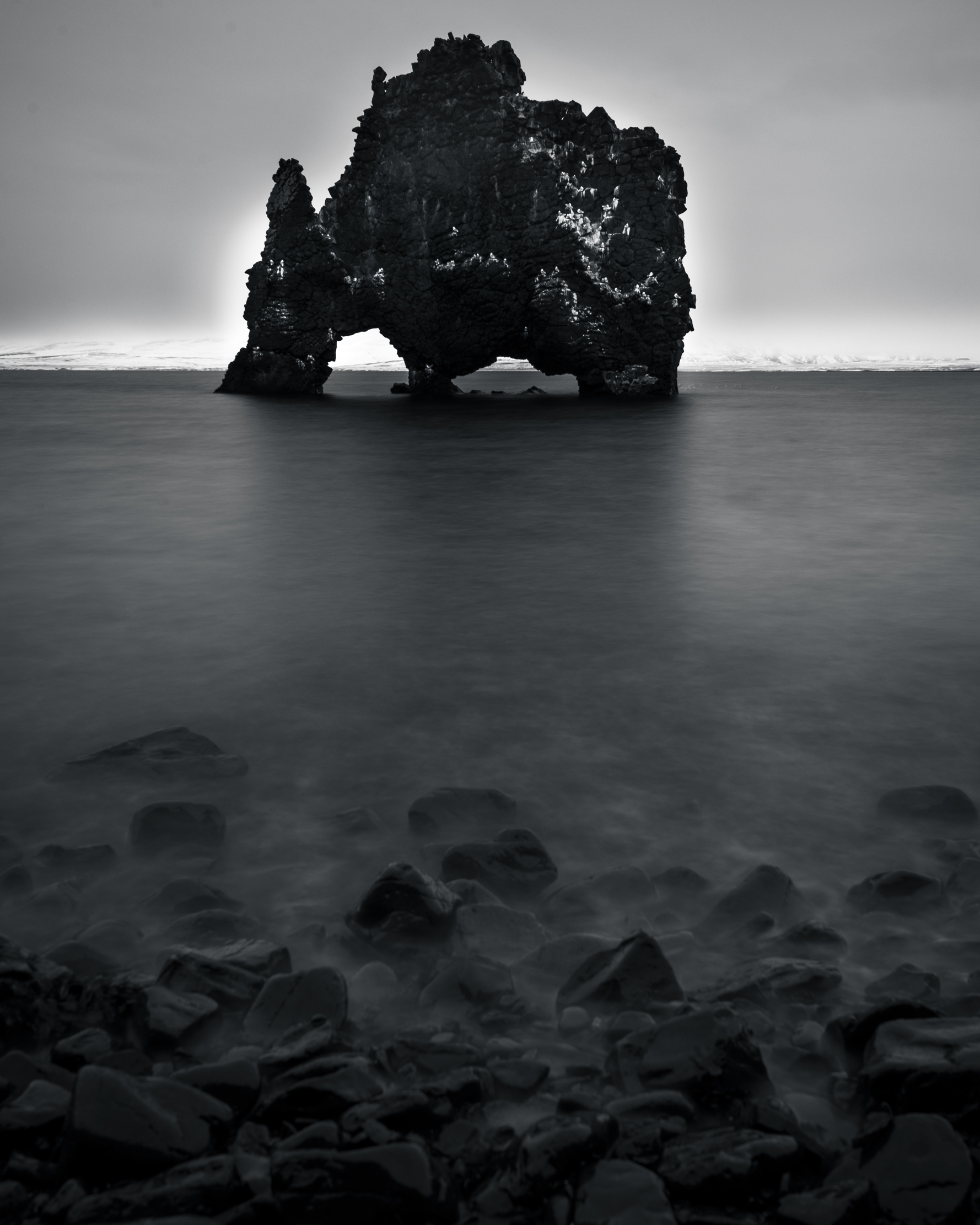 Hvítserkur basalt rock stack at high tide, Húnafjörður, northwest Iceland — long exposure black and white photography by Marcel Strobel