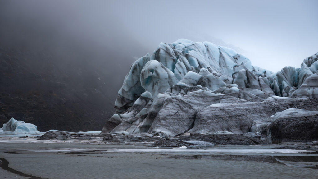 Blue glacial ice detail at Svínafellsjökull, Vatnajökull, south Iceland — photographed by Marcel Strobel