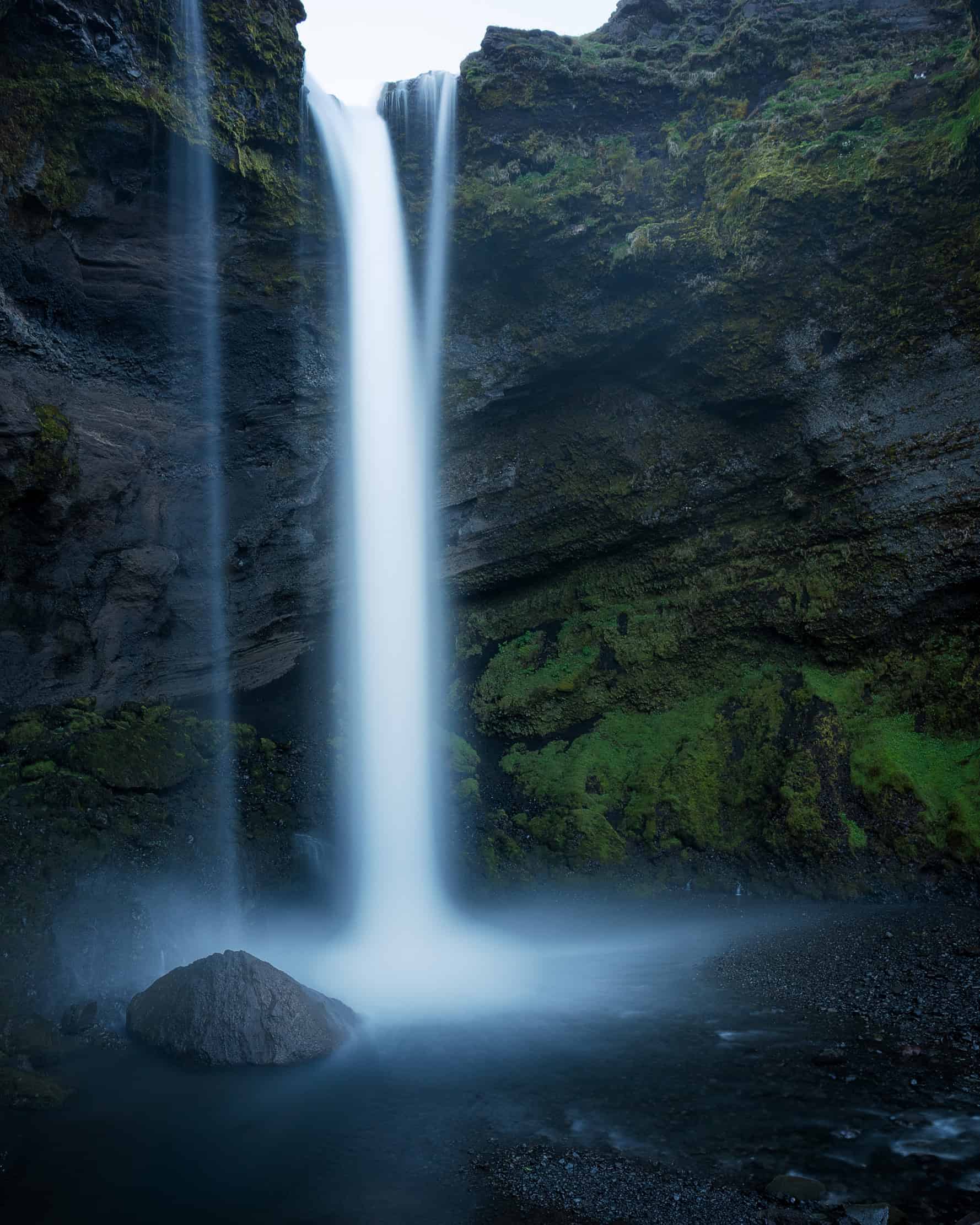 Kvernufoss waterfall near Skógar in near-midnight light, late May, South Iceland — photographed by Marcel Strobel