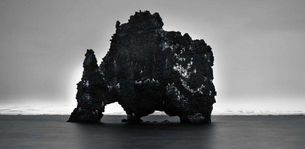 Hvítserkur basalt rock stack at high tide, Húnafjörður, northwest Iceland — long exposure black and white photography by Marcel Strobel
